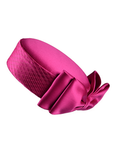 Fuchsia Aveline silk pillbox with tight veiling around circumference and tailored silk bow