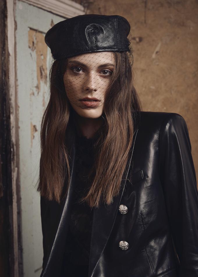 Designer black leather flat cap with veil