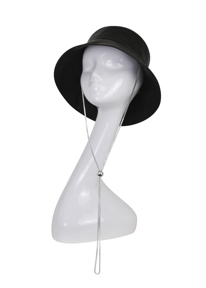 Black leather bucket hat with crystal toggle on mannequin