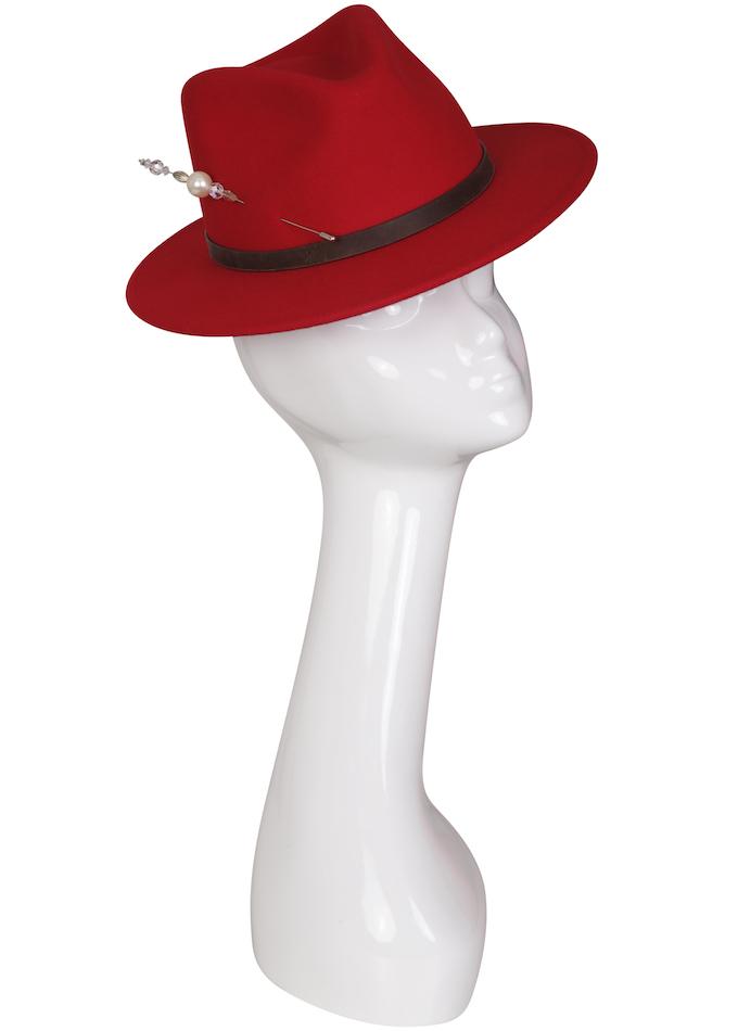 Red felt fedora with pearl hatpin on mannequin