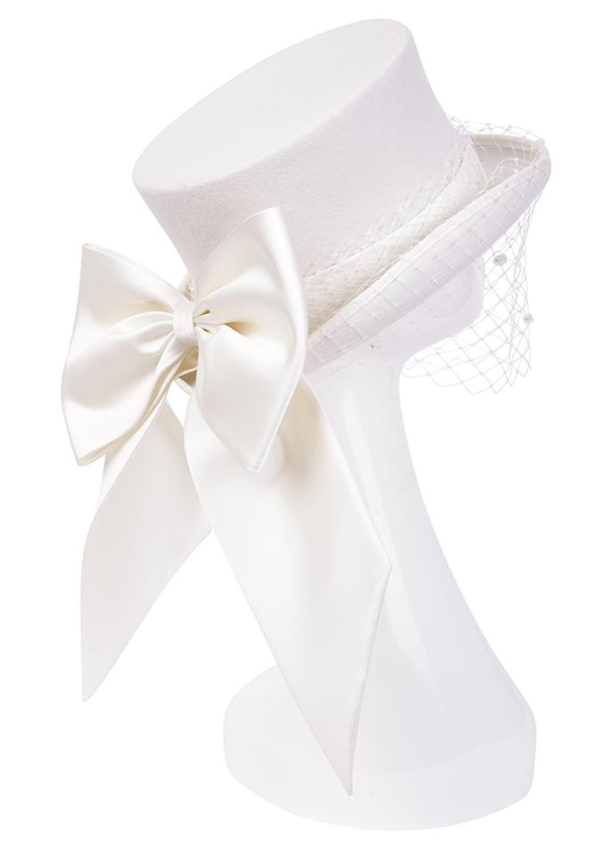 White top hat with veil and oversized silk bow on mannequin