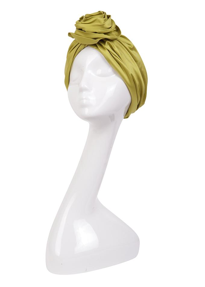 Chartreuse silk designer turban on mannequin