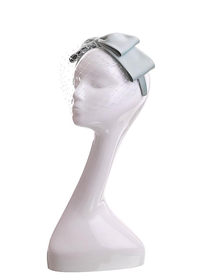 Aanya headpiece from luxury headwear collection by Emily London displayed on mannequin