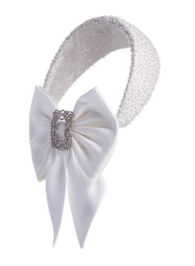 Ivory embellished headpiece with silk bow and crystal brooch