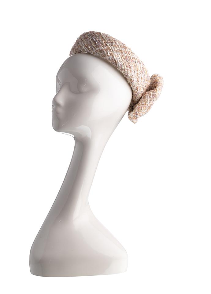 Bouclé tweed halo headpiece with bow on mannequin