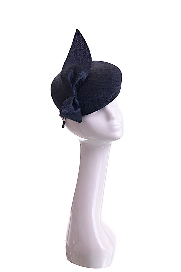 Navy straw beret pillbox hat with straw knot detail on mannequin