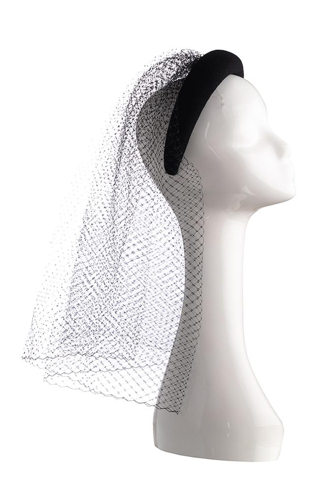 Black velvet headband with long black veil on mannequin