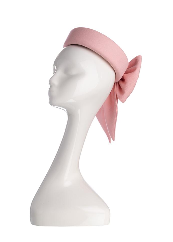 Pale pink silk crepe Jackie O style pillbox hat on mannequin