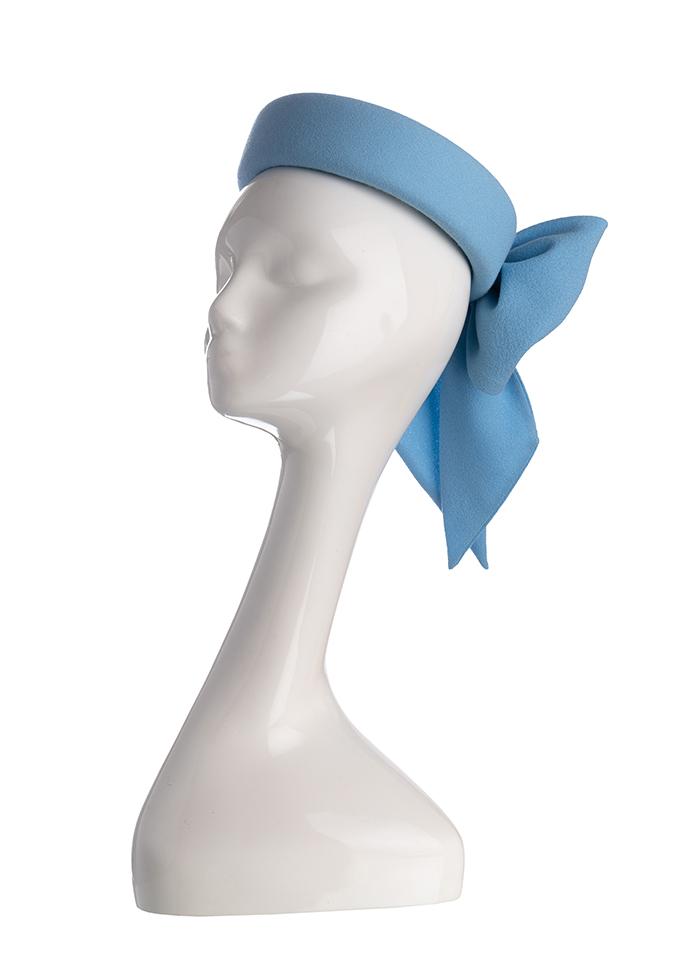 Blue silk crepe Jackie O style pillbox hat on mannequin
