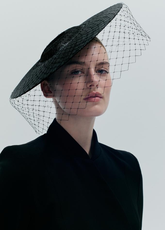 Model image of black Zaehtia straw disc hat with birdcage veil