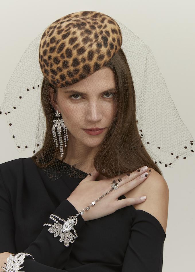Emily-London leopard print felt pillbox hat with long veil on model
