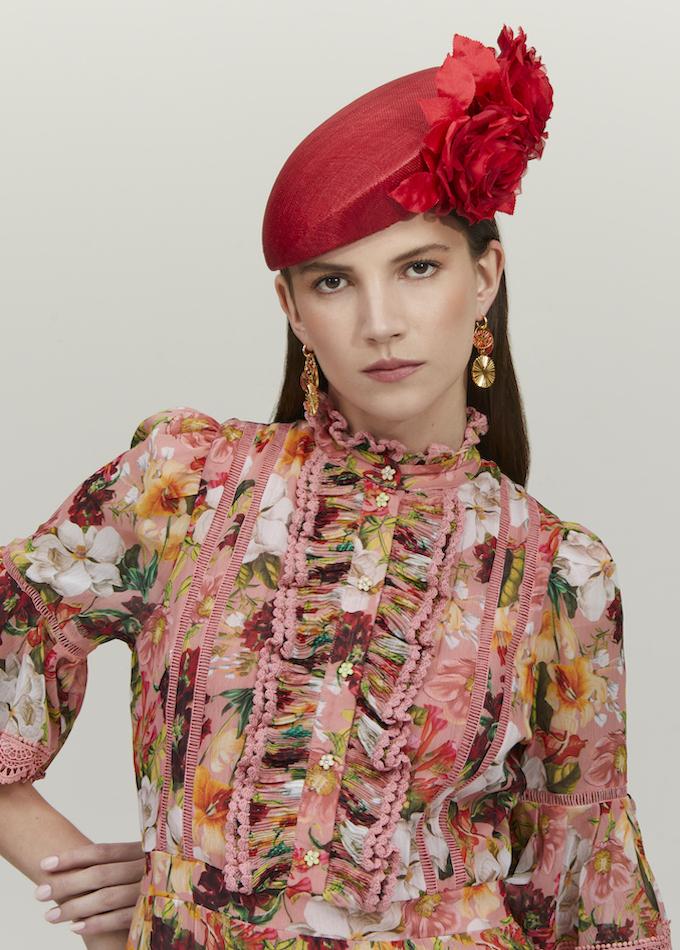 Emily-London red straw pillbox hat with red roses on model