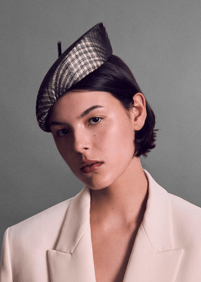 Chloe black and white check straw beret pillbox hat on model