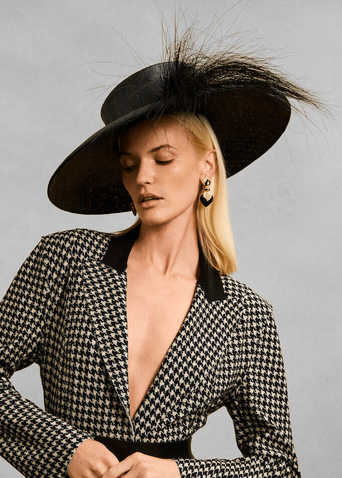 Alexis large wide brim straw hat with asymmetric crown and burnt peacock feathers