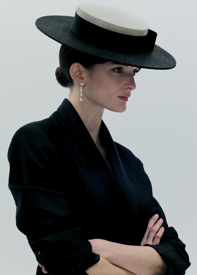 Model image (1) of Howie black and white straw boater with tailored silk band and side bow