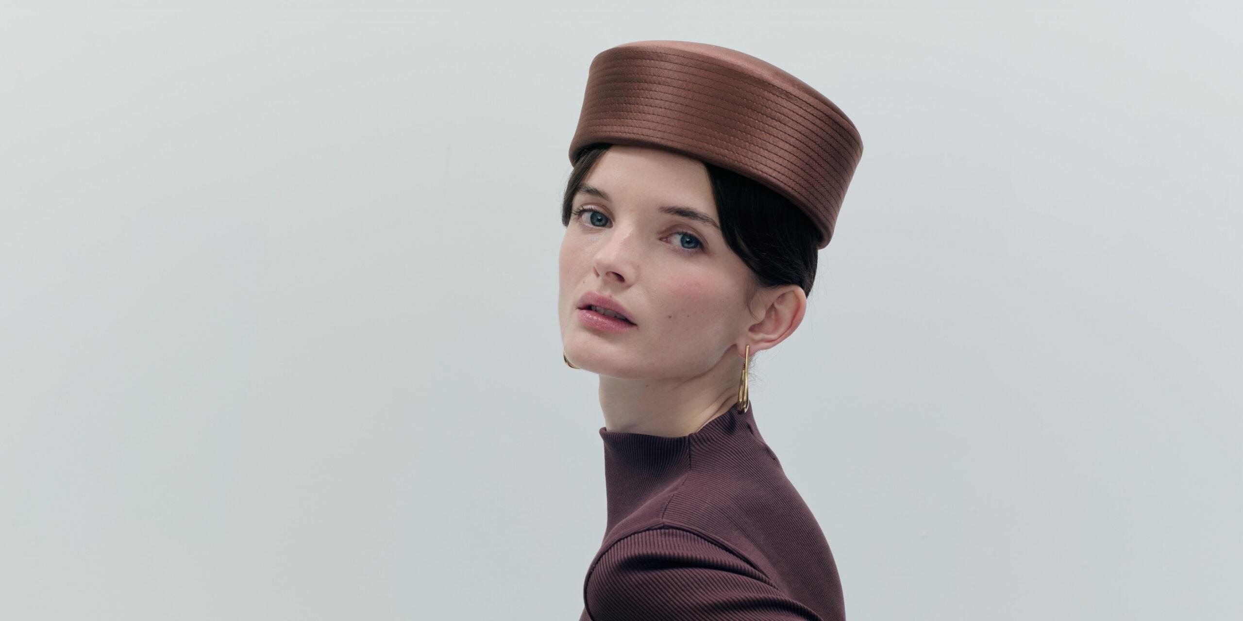 Model image of brown Amal silk pillbox hat